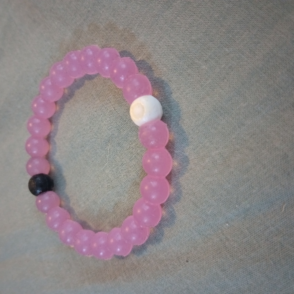 Pink Beaded Bracelet with White and Black Accents